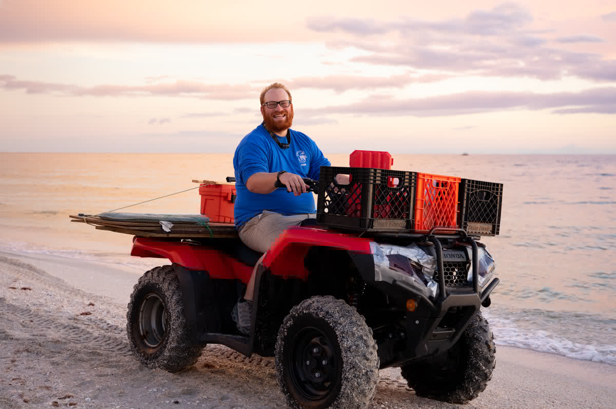 Mote's Dr. Jake Lasala uses an ATV (all-terrain vehicle) during permitted sea turtle research on southwest Florida beaches.