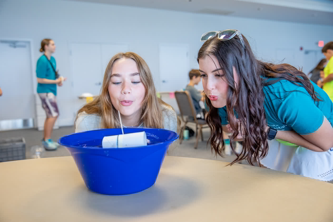 Student and Instructor in Mote Adventure Camp participating in a class activity